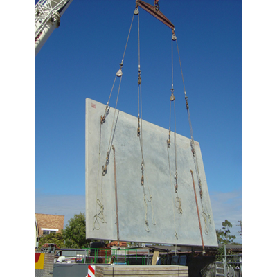 Crane lifting a concrete slab