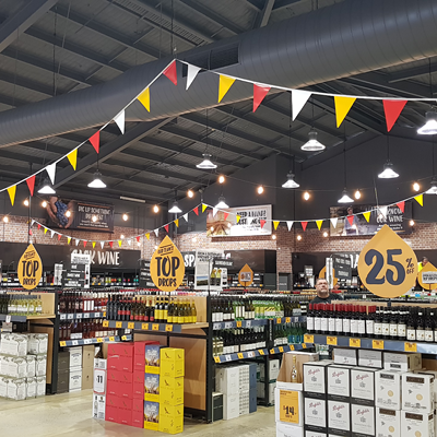 First Choice Liquor store after CSG's team completed renovation works. Completed store with shelving and signage.